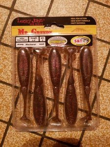 Lures Lucky John  Mr. Greedy